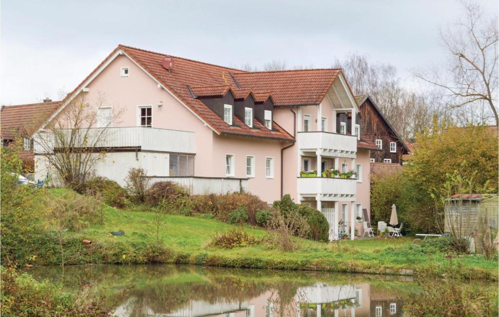 a house on the side of a river at Gorgeous Apartment In Heinersreuth With Wifi in Heinersreuth