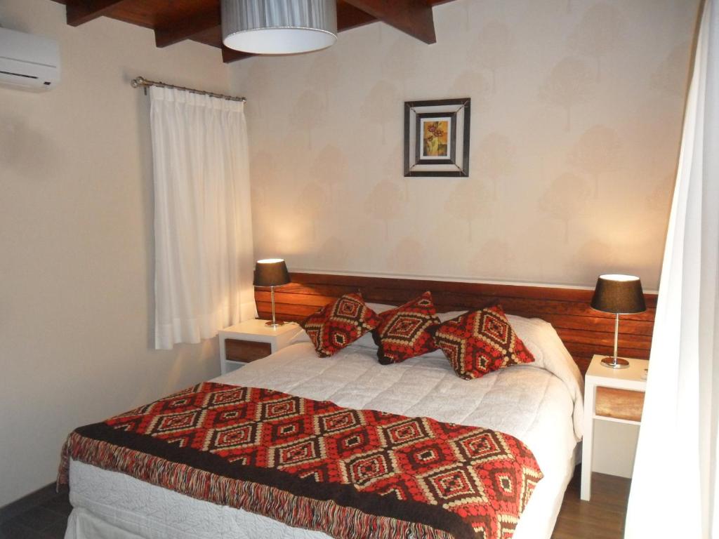 Postel nebo postele na pokoji v ubytování Gran Hotel Tourbillon & Lodge