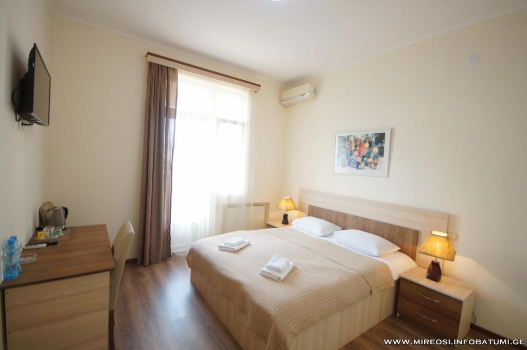 Postel nebo postele na pokoji v ubytování Hotel Mireosi