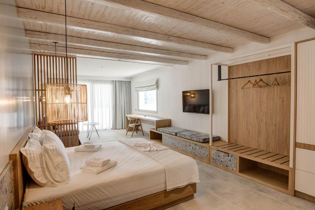 Postel nebo postele na pokoji v ubytování Alboro seaside suites