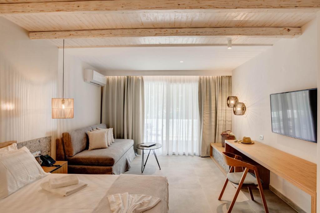 TV a/nebo společenská místnost v ubytování Alboro seaside suites