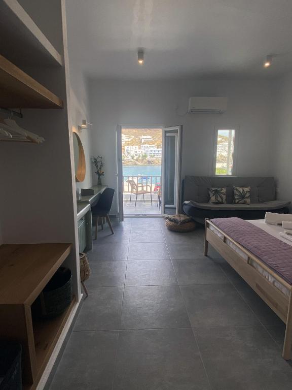 Postel nebo postele na pokoji v ubytování Xenios Zeus Apartments