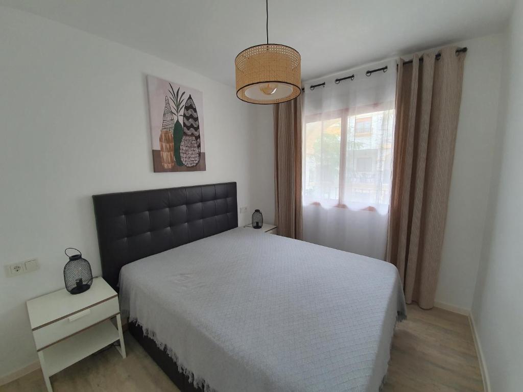 Postel nebo postele na pokoji v ubytování Lovely Apartment in Denia; El Patio