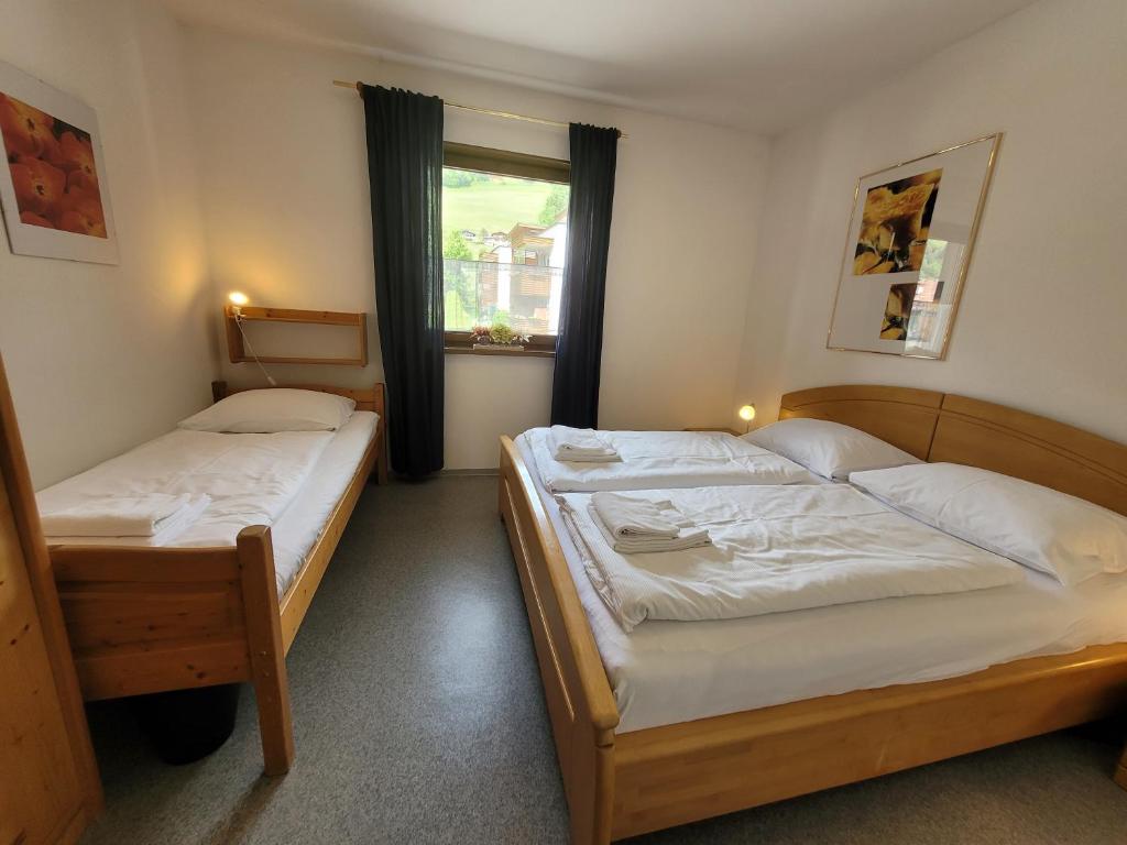 Posteľ alebo postele v izbe v ubytovaní Profelt`s Apartments Uttendorf - Steinbock Lodges