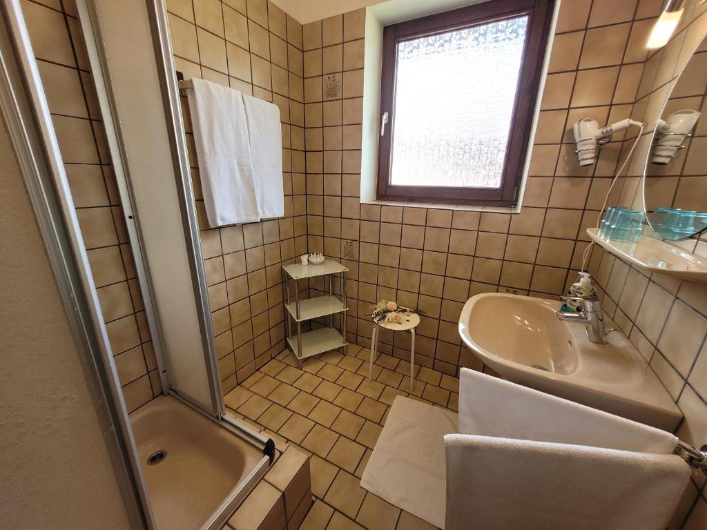 Kúpeľňa v ubytovaní Profelt`s Apartments Uttendorf - Steinbock Lodges