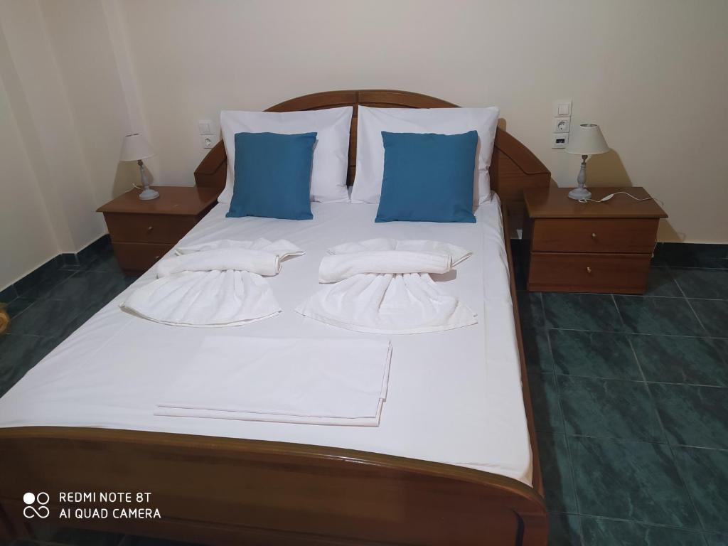 Posteľ alebo postele v izbe v ubytovaní Odisseas Apartment
