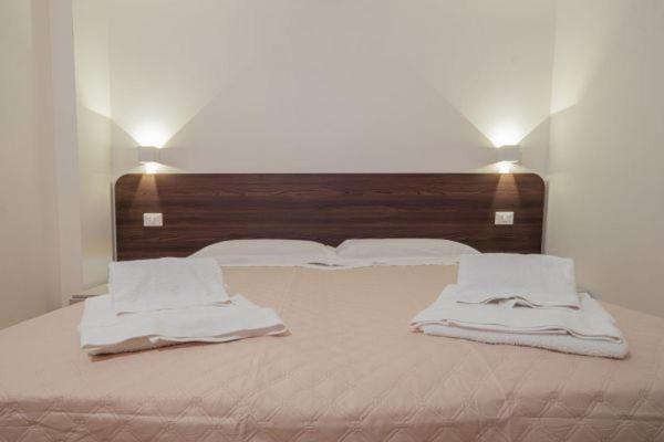 Postel nebo postele na pokoji v ubytování I Lamioni - Suite & accommodation