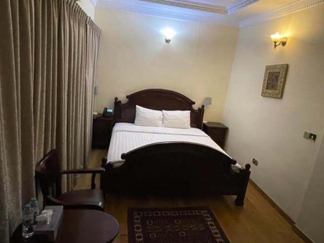 Katil atau katil-katil dalam bilik di Al Khariss Hotel