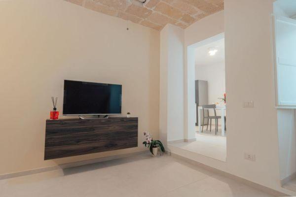 TV a/nebo společenská místnost v ubytování I Lamioni - Suite & accommodation