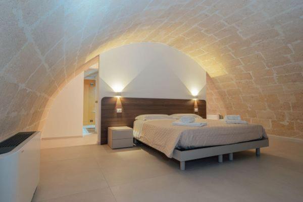 Postel nebo postele na pokoji v ubytování I Lamioni - Suite & accommodation