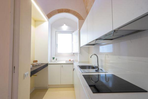 Kuchyň nebo kuchyňský kout v ubytování I Lamioni - Suite & accommodation