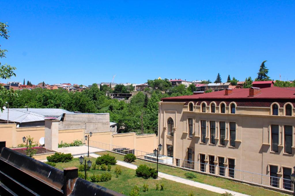 a view of a building in a city at Nino's Guest House in Tbilisi City
