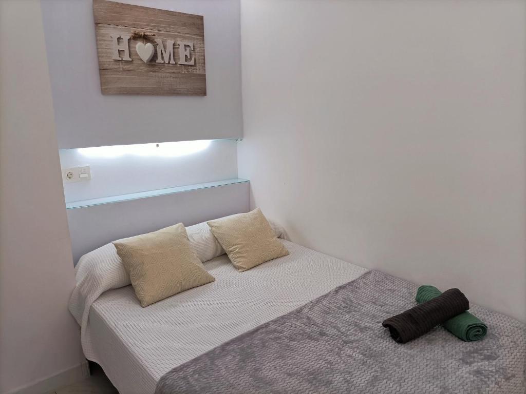 Voodi või voodid majutusasutuse Cómodo apartamento al lado de la playa de Las Canteras toas