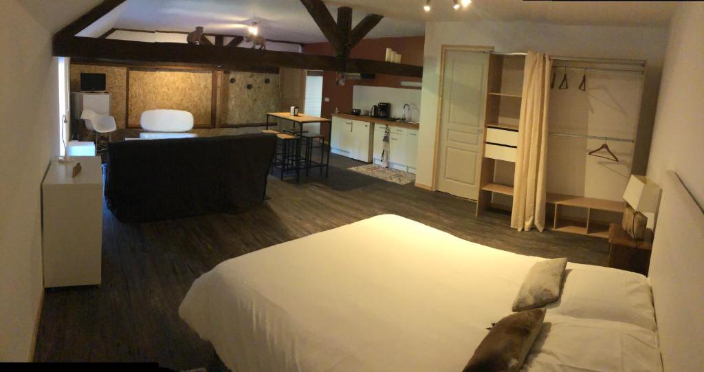 Postel nebo postele na pokoji v ubytování Hotel Du Parc