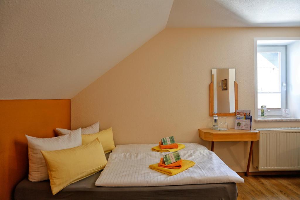 Voodi või voodid majutusasutuse Konsum Gästehaus Quisisana - Oberhof toas
