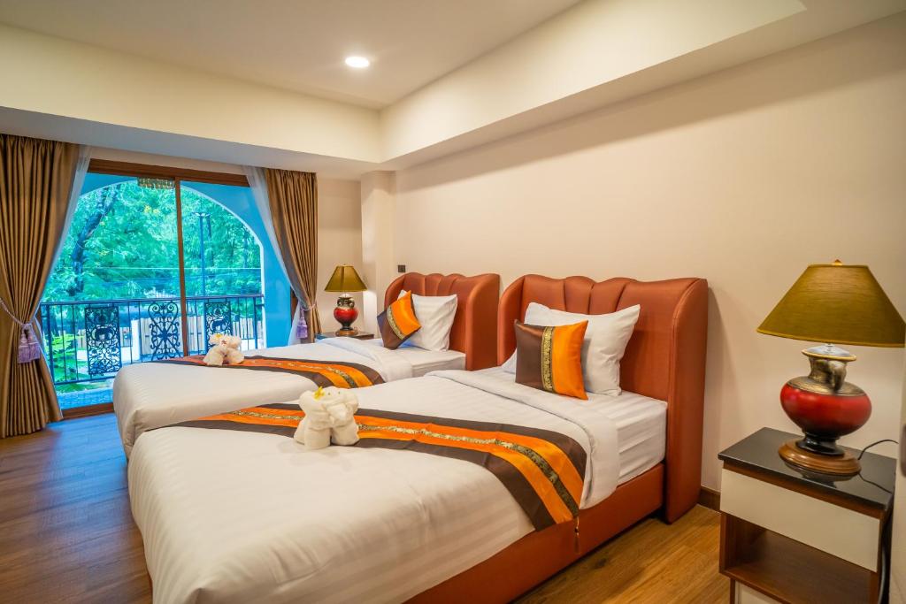Siri Nakornpink Chiang Mai Hotel SHA Plus - Resim 12