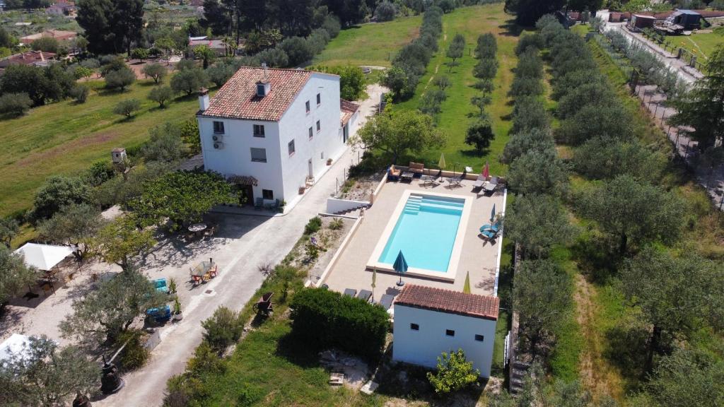 an aerial view of a house with a swimming pool at B&B Casa Vitalidad in Ontinyent