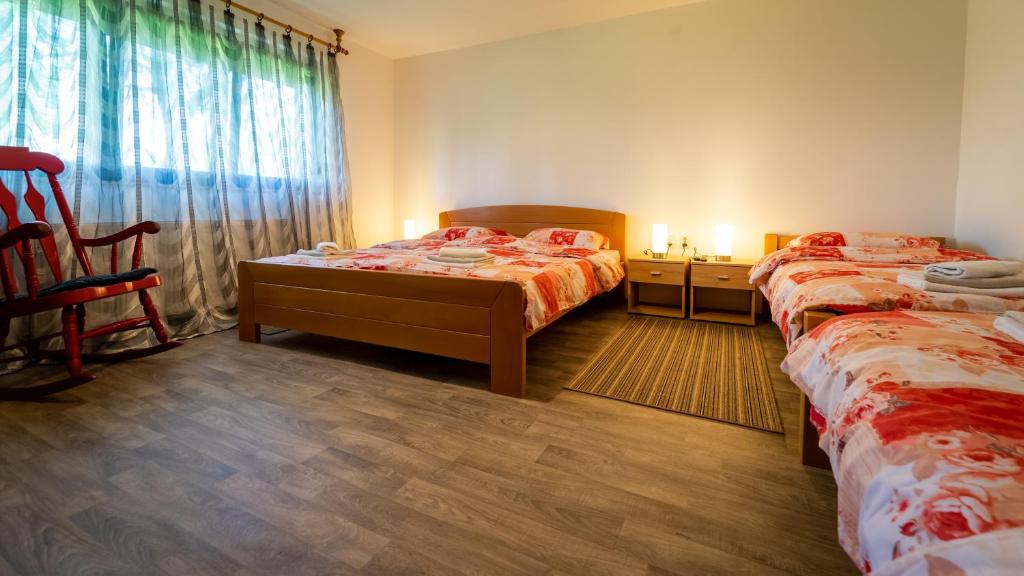 Postel nebo postele na pokoji v ubytování Holiday Home "Sleme" with jacuzzi, big garden and arbor with fireplace