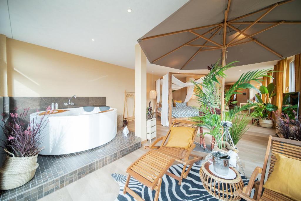 Posezení v ubytování Hotel Zeit & Traum Privat SPA