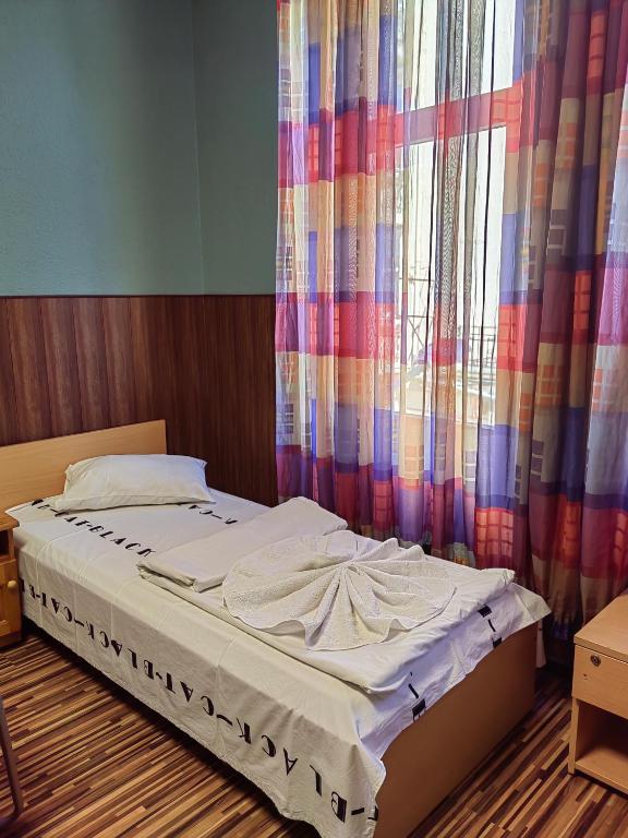 Postel nebo postele na pokoji v ubytování KM!Sofia - Стаи за гости