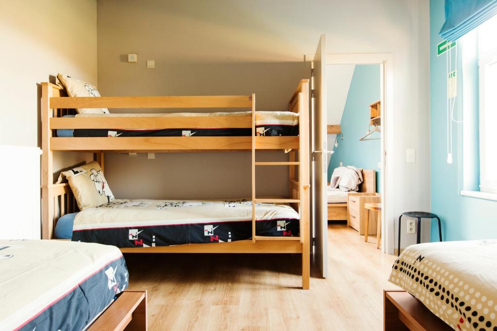 Postel nebo postele na pokoji v ubytování B&B Hoeve de Schapenkop
