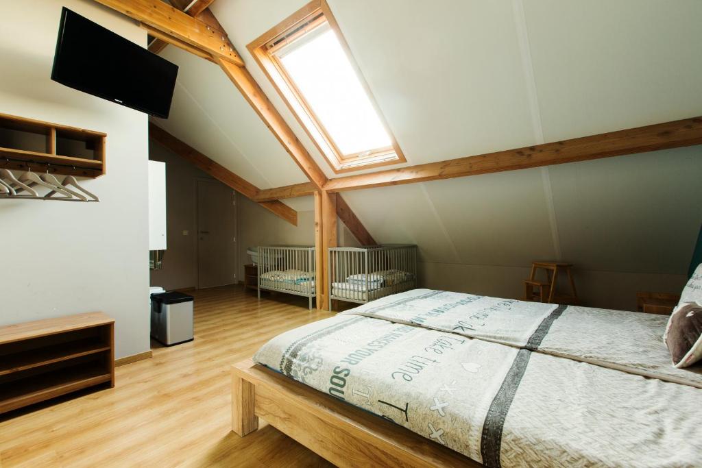 Postel nebo postele na pokoji v ubytování B&B Hoeve de Schapenkop