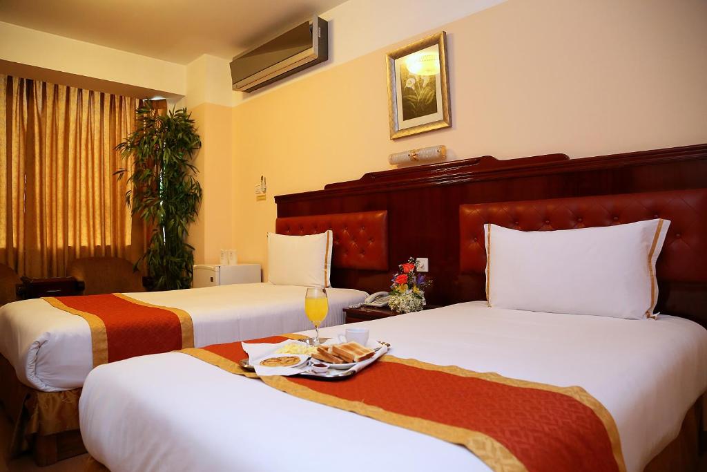 Postel nebo postele na pokoji v ubytování Hotel Princesa