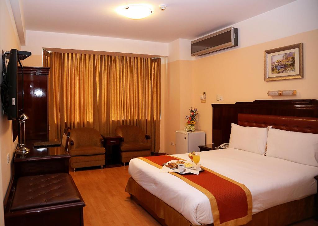 Postel nebo postele na pokoji v ubytování Hotel Princesa
