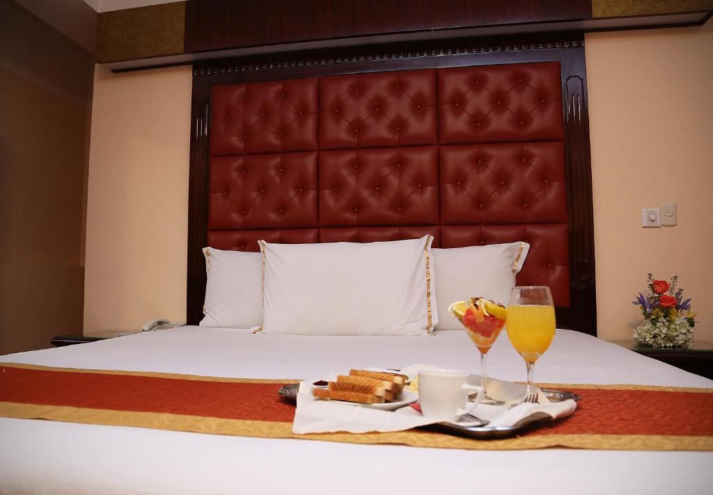 Postel nebo postele na pokoji v ubytování Hotel Princesa