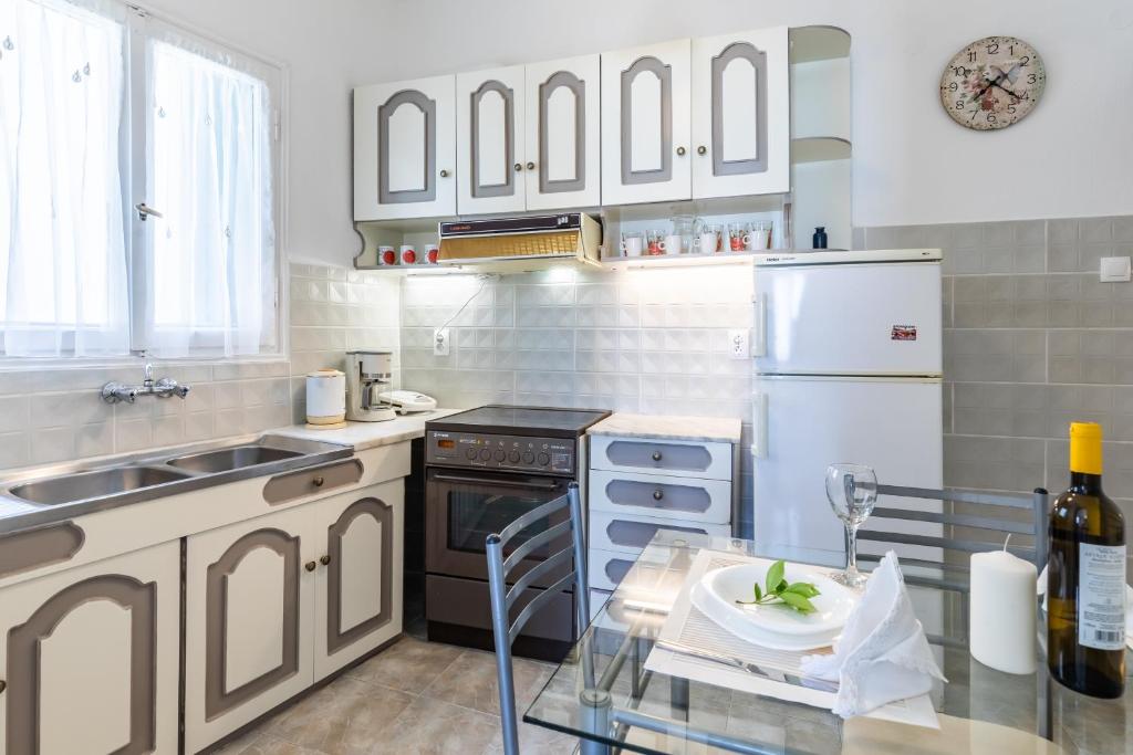Kuchyň nebo kuchyňský kout v ubytování Marialena Rooms