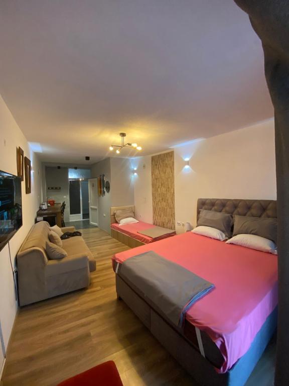 Postel nebo postele na pokoji v ubytování ZANI Hostel