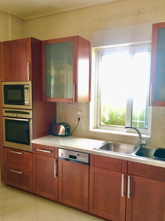 A kitchen or kitchenette at My Way Hotel