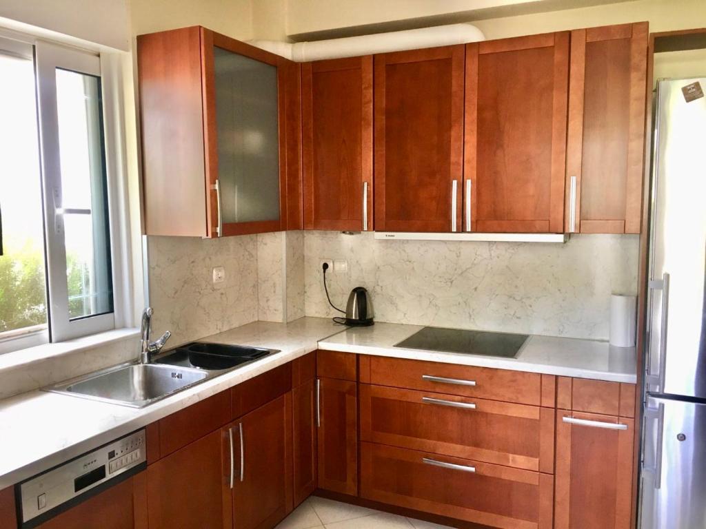 A kitchen or kitchenette at My Way Hotel