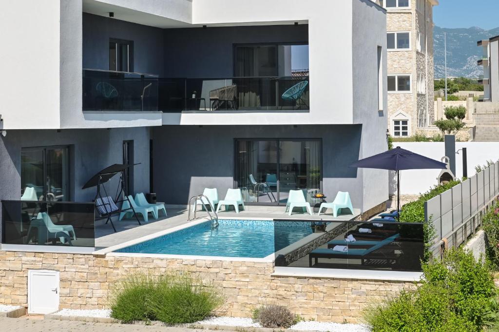 an image of a house with a swimming pool at Pool Villa Vistamar in Novalja