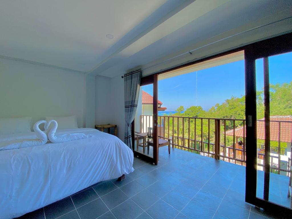 Cama o camas de una habitación en Ocean View Villas