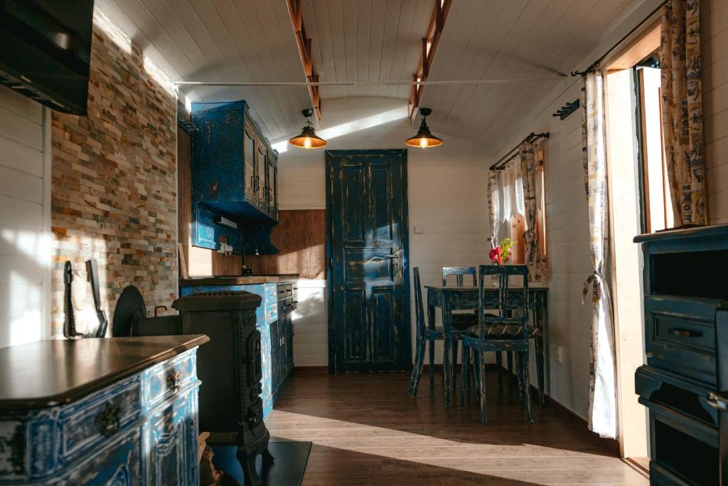 Kuchyň nebo kuchyňský kout v ubytování Chata u lesa RANCH NA HRANICI