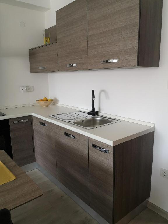 Kuchyň nebo kuchyňský kout v ubytování Apartments Tanja
