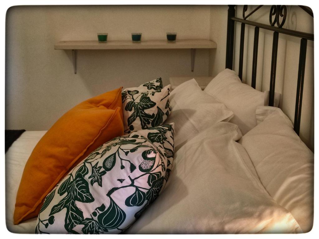 Postel nebo postele na pokoji v ubytování B&B il Faso vicino Zoosafari di Fasano