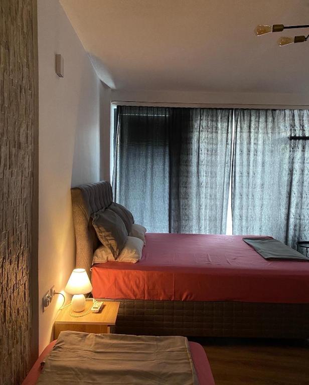 Postel nebo postele na pokoji v ubytování ZANI Hostel