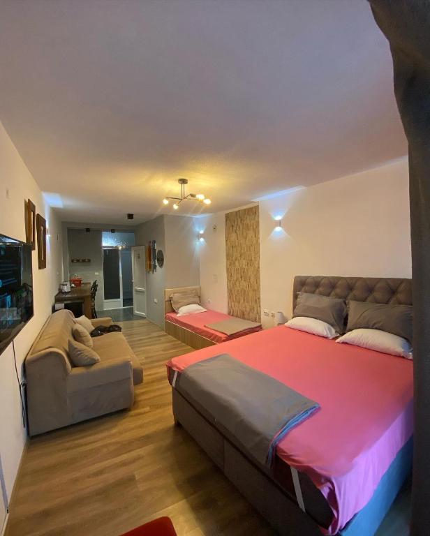 Postel nebo postele na pokoji v ubytování ZANI Hostel