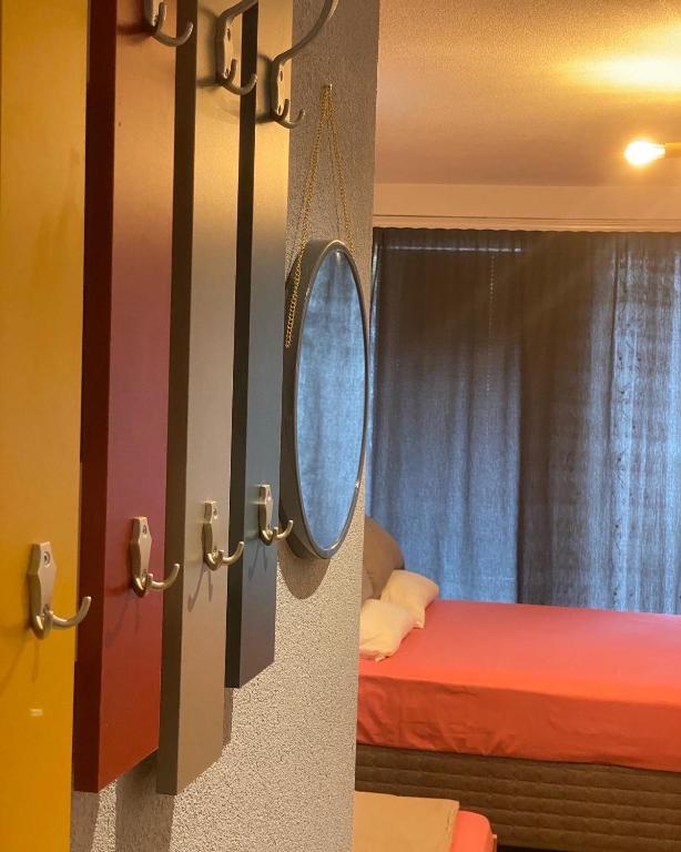 Postel nebo postele na pokoji v ubytování ZANI Hostel