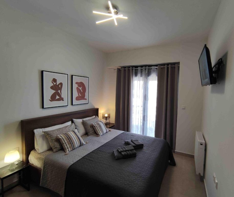 Posteľ alebo postele v izbe v ubytovaní Grey Swan - Modern & Stylish apartment with Private Parking