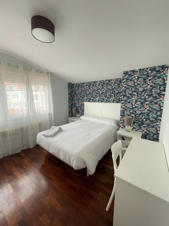 Posteľ alebo postele v izbe v ubytovaní Hostal Portofino