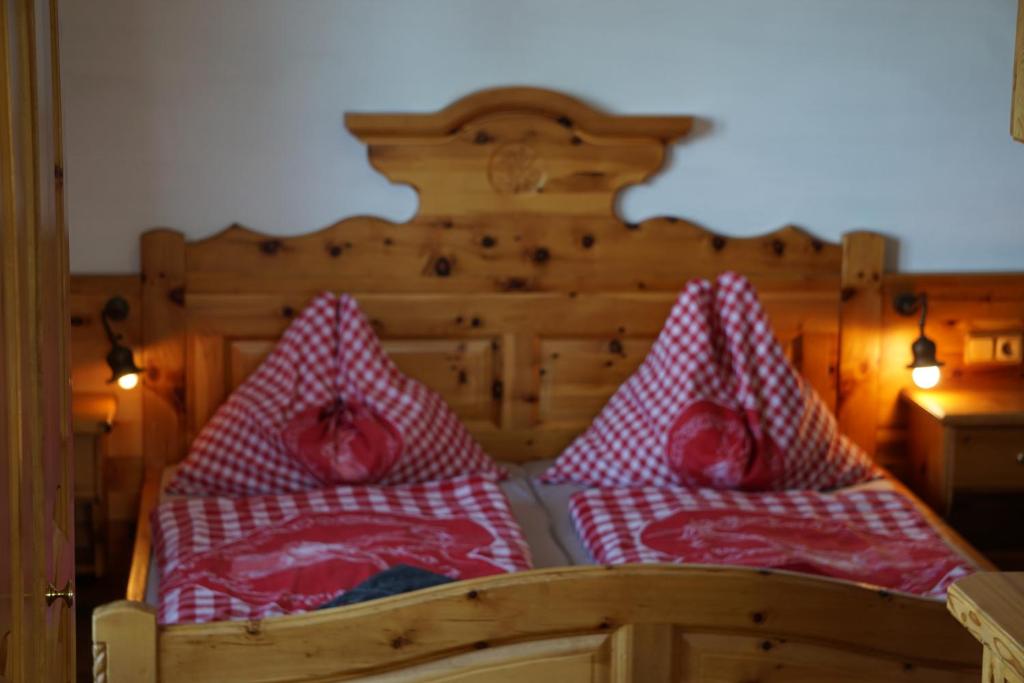 Postel nebo postele na pokoji v ubytování Hainererhof
