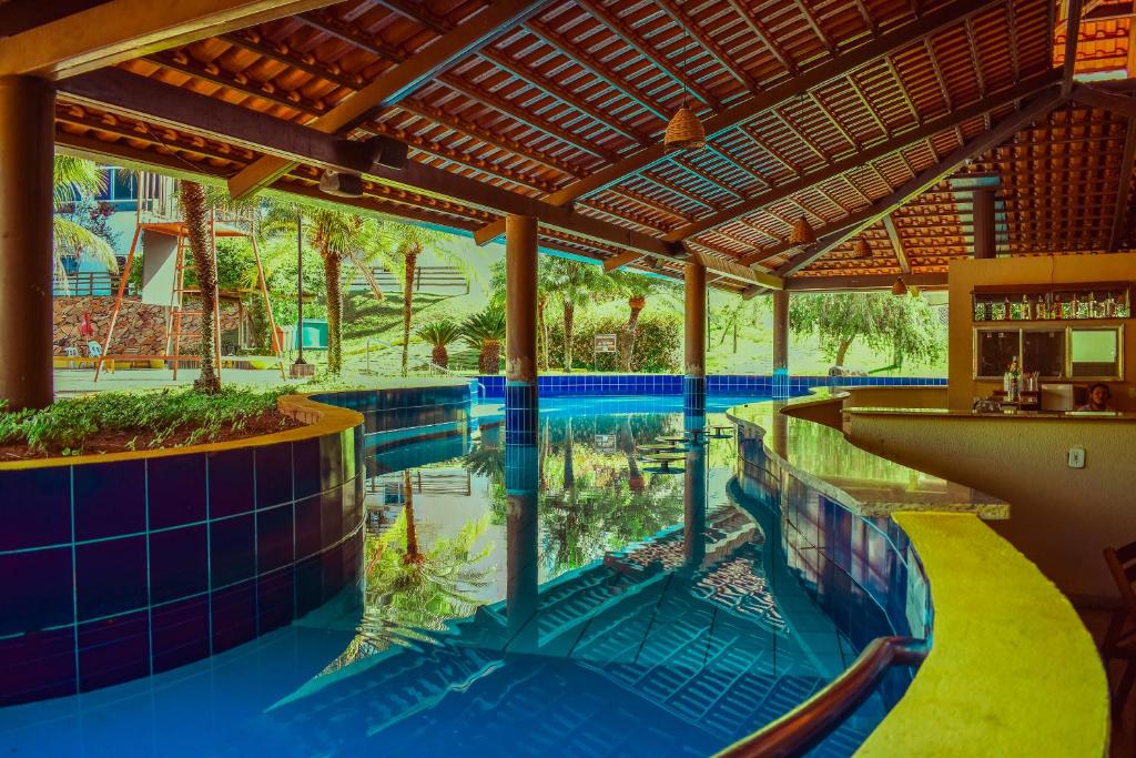 Bazén v ubytování Ecologic Ville Resort - Oficial nebo v jeho okolí