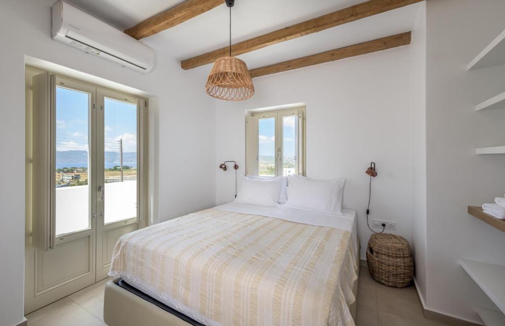 Katil atau katil-katil dalam bilik di Milos Zen Suites