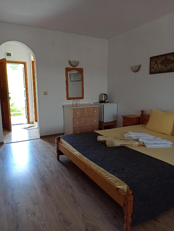 Postel nebo postele na pokoji v ubytování Hotel Gamartata