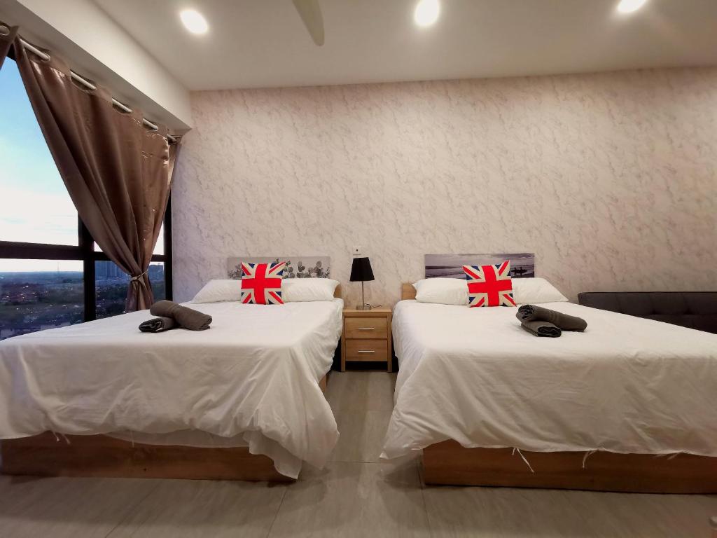 Postel nebo postele na pokoji v ubytování Bell Suite - The Premium Suite @ Sepang