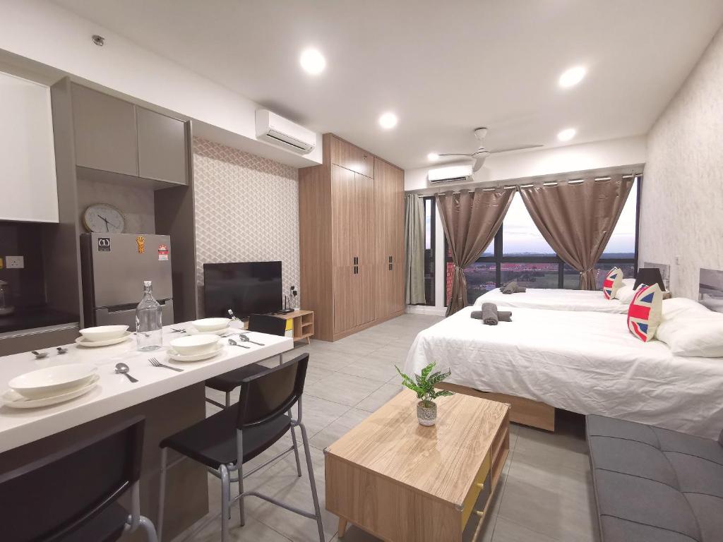 Postel nebo postele na pokoji v ubytování Bell Suite - The Premium Suite @ Sepang
