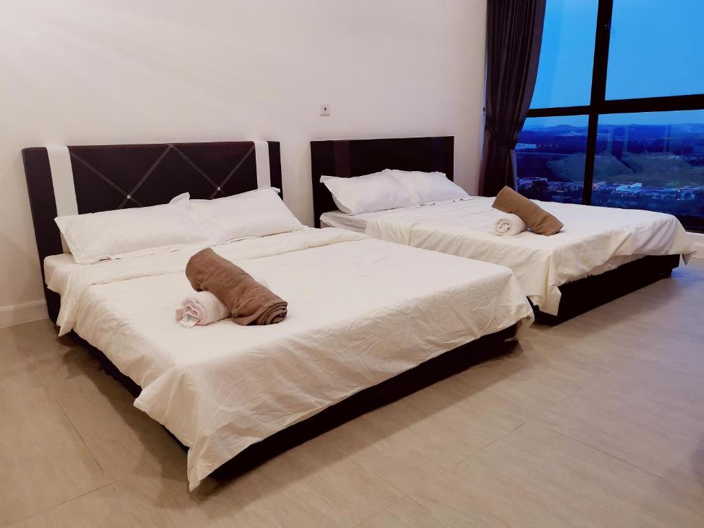 Postel nebo postele na pokoji v ubytování Bell Suite - The Premium Suite @ Sepang